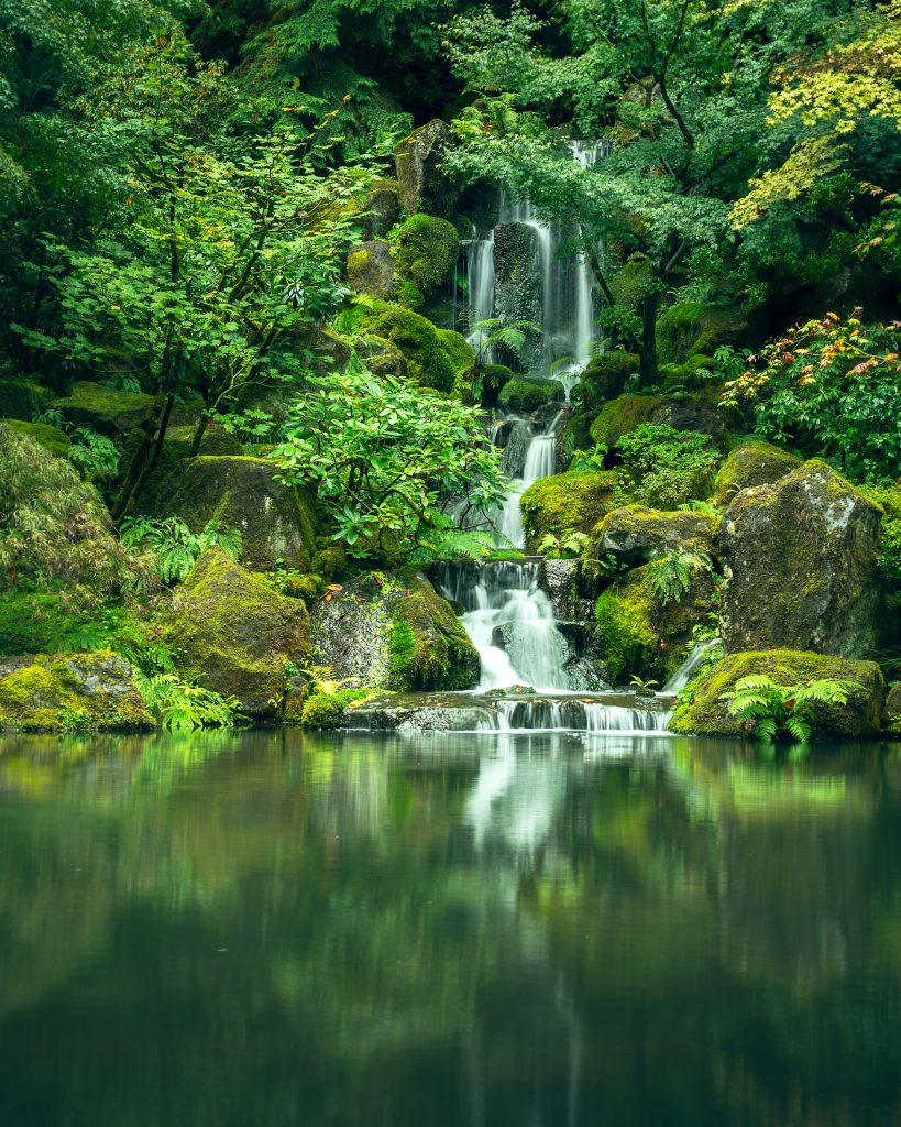 Sumampan triple-tiered waterfall with emerald pool in Bali